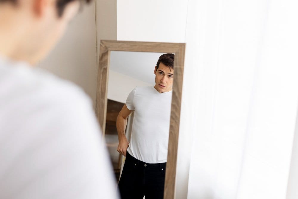 person choosing clothes wear